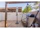 Relaxing patio with grill, umbrella, and hammock at 170 E Guadalupe Rd # 14, Gilbert, AZ 85234