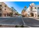 Scenic street view of a charming neighborhood with shops and restaurants at 21211 W Minnezona Ave, Buckeye, AZ 85396