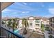 Complex aerial view showcasing the pool and building architecture at 2315 N 52Nd St # 120, Phoenix, AZ 85008