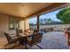 Relaxing backyard oasis with a pool and covered patio at 501 E Sunburst Ln, Tempe, AZ 85284