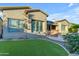 Backyard with artificial turf and an outdoor kitchen at 501 E Sunburst Ln, Tempe, AZ 85284