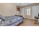 Bright bedroom featuring a comfortable bed and plenty of natural light at 501 E Sunburst Ln, Tempe, AZ 85284