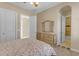 Spacious bedroom with ensuite bathroom and large windows at 501 E Sunburst Ln, Tempe, AZ 85284