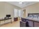 Spacious bedroom with a comfortable bed and built-in desk at 501 E Sunburst Ln, Tempe, AZ 85284