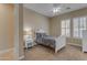 Cozy bedroom with a white bed frame and ample natural light at 501 E Sunburst Ln, Tempe, AZ 85284