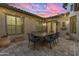 Cozy courtyard perfect for outdoor dining under string lights at 501 E Sunburst Ln, Tempe, AZ 85284