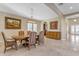 Spacious dining room with hardwood floors and large windows at 501 E Sunburst Ln, Tempe, AZ 85284
