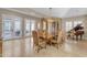 Dining room with patio access, hardwood floors and large windows at 501 E Sunburst Ln, Tempe, AZ 85284
