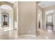 Bright hallway with tile flooring and access to bedrooms at 501 E Sunburst Ln, Tempe, AZ 85284