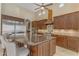 Modern kitchen with stainless steel appliances and custom cabinetry at 501 E Sunburst Ln, Tempe, AZ 85284