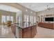 Large kitchen island with granite countertop and stainless steel appliances at 501 E Sunburst Ln, Tempe, AZ 85284