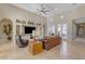 Relaxing living room with built-in entertainment center and patio access at 501 E Sunburst Ln, Tempe, AZ 85284