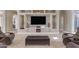 Spacious living room with high ceilings, featuring a built-in entertainment center and comfortable seating at 501 E Sunburst Ln, Tempe, AZ 85284