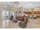 Open living area with kitchen views and access to backyard patio at 501 E Sunburst Ln, Tempe, AZ 85284