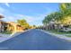 Residential street lined with upscale homes and lush landscaping at 501 E Sunburst Ln, Tempe, AZ 85284