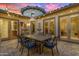 Outdoor patio with dining area and string lights at 501 E Sunburst Ln, Tempe, AZ 85284