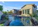 Stunning pool with a waterfall feature and spacious backyard at 501 E Sunburst Ln, Tempe, AZ 85284