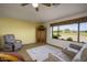 Relaxing living room with exterior view and neutral-colored furniture at 11250 E Kilarea Ave # 252, Mesa, AZ 85209