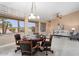Inviting living room showcasing natural light, a game table, and comfortable seating at 19814 N Shadow Mountain Dr, Surprise, AZ 85374