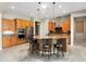 Gourmet kitchen boasts stainless appliances, granite counters, and ample cabinet space at 26822 W Oraibi Dr, Buckeye, AZ 85396