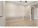 Open living space features neutral paint and tile floor at 26822 W Oraibi Dr, Buckeye, AZ 85396