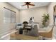 Home office with a modern desk, stylish chair, and a serene, focused workspace at 26822 W Oraibi Dr, Buckeye, AZ 85396