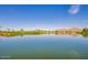 Scenic view of a tranquil lake and mountain landscape at 298 E Diamond Trl, San Tan Valley, AZ 85143