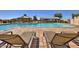 Relaxing pool area with lounge chairs and gazebos at 298 E Diamond Trl, San Tan Valley, AZ 85143