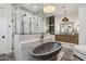 Luxury bathroom featuring a free-standing tub and a large walk-in shower at 4424 N 38Th St, Phoenix, AZ 85018