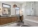 Spa-like bathroom with soaking tub, walk-in shower, and dual vanities at 4424 N 38Th St, Phoenix, AZ 85018