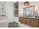 Modern bathroom with floating vanity and glass-front storage cabinet at 4424 N 38Th St, Phoenix, AZ 85018