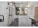 Bathroom with a walk-in shower and dark-colored soaking tub at 4424 N 38Th St, Phoenix, AZ 85018