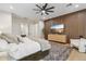 Serene bedroom with a built-in media wall and sitting area at 4424 N 38Th St, Phoenix, AZ 85018
