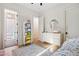 Charming bedroom with white dresser and a floral bedspread at 4424 N 38Th St, Phoenix, AZ 85018
