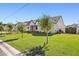 Eye-catching curb appeal with lush lawn and mature trees at 4424 N 38Th St, Phoenix, AZ 85018