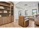 Relaxing Gathering room with built-in shelving and comfortable seating at 4424 N 38Th St, Phoenix, AZ 85018