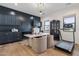 Home office with desk, chairs, and a treadmill at 4424 N 38Th St, Phoenix, AZ 85018