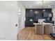 Bright home office with built-in cabinetry and hardwood floors at 4424 N 38Th St, Phoenix, AZ 85018