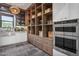 Well-equipped kitchen featuring ample cabinetry, high-end appliances, and marble countertops at 4424 N 38Th St, Phoenix, AZ 85018