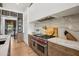 Modern kitchen features marble countertops, professional range, and custom cabinetry at 4424 N 38Th St, Phoenix, AZ 85018
