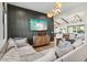 Spacious living room featuring a large sectional sofa and stylish decor at 4424 N 38Th St, Phoenix, AZ 85018