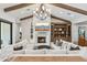 Spacious living room features a cozy fireplace, vaulted ceilings, and built-in shelving at 4424 N 38Th St, Phoenix, AZ 85018