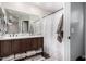Bathroom boasts a double vanity and updated fixtures at 8813 N 112Th Ave, Peoria, AZ 85345