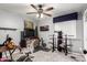 Bedroom with home office setup and ceiling fan at 8813 N 112Th Ave, Peoria, AZ 85345