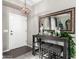 Entryway with console table, mirror, and three stools at 8813 N 112Th Ave, Peoria, AZ 85345