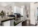 Kitchen with white cabinets, granite counters, and stainless steel appliances at 8813 N 112Th Ave, Peoria, AZ 85345