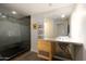 Modern bathroom with a glass shower, a unique sink, and a minimalist design at 914 E Osborn Rd # 202, Phoenix, AZ 85014