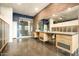 Unique bathroom features a brick wall, a large mirror, and a trough sink and modern glass shower at 914 E Osborn Rd # 202, Phoenix, AZ 85014