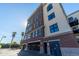 Brick building with parking and gated access at 914 E Osborn Rd # 202, Phoenix, AZ 85014
