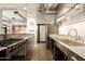 Modern kitchen featuring stainless steel appliances, countertops, and a sleek design at 914 E Osborn Rd # 202, Phoenix, AZ 85014